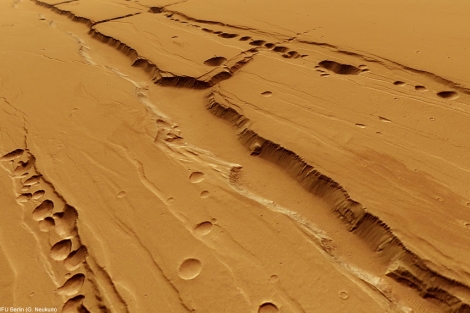 Cadenas de cráteres de subsidencia en Tharsis. | ESA