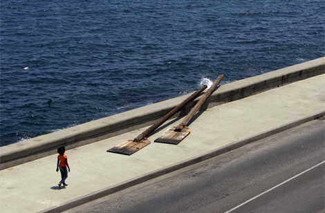 Unos remos,en el Malecón. | Efe Unos remos,en el Malecón. | Efe