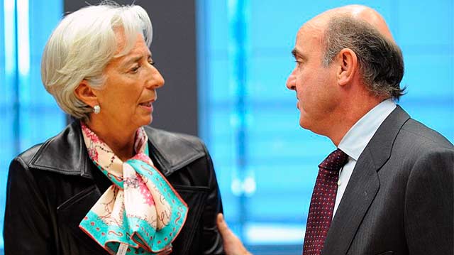 Christine Lagarde, directora del FMI, y Luis de Guindos. | Afp Christine Lagarde, directora del FMI, y Luis de Guindos. | Afp