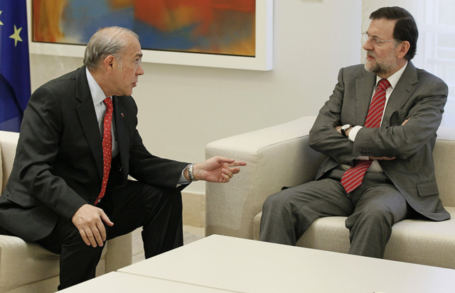 El secretario general de la OCDE, Ángel Gurría, junto a Rajoy | Efe