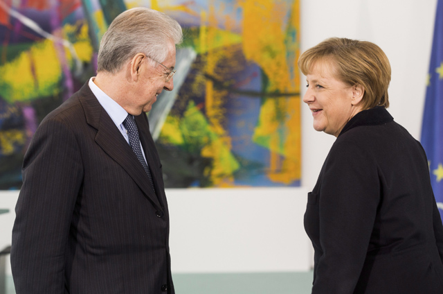 El primer ministro italiano, Mario Monti, junto a la canciller alemana. | Getty El primer ministro italiano, Mario Monti, junto a la canciller alemana. | Getty