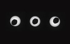 Tres fases del eclipse solar en Marte.